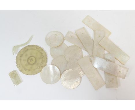 Fifteen Chinese mother of pearl counters, early 19th Century, comprising eight rectangular and seven circular, all monogramme