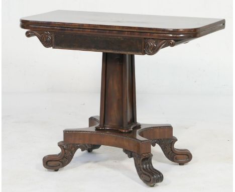 George IV mahogany pedestal folding tea table, circa 1825-30, the folding top opening to a polished surface, acanthus carved 