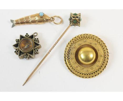 Victorian gold target brooch, unmarked, 28mm diameter, gross weight approx. 4.9g; also a yellow metal fish charm with turquoi