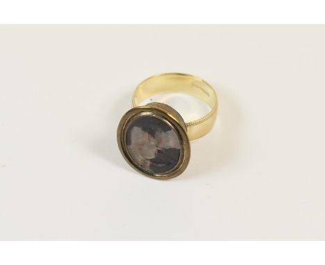 Intaglio seal, featuring the profile of a gentleman, within a yellow metal bezel, probably Continental 17th or 18th Century, 