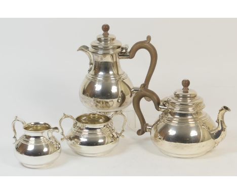 George VI silver four piece tea service by George Frederick Lowe, Chester 1947, in Queen Anne style, comprising baluster teap