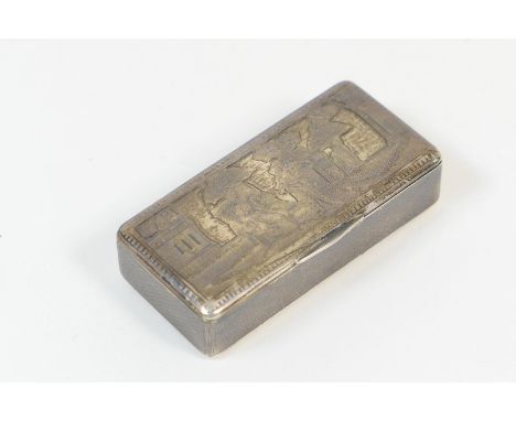 Russian niello silver snuff box, third quarter 19th Century, rectangular form, the hinged cover worked with a figure reading 