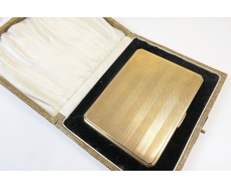 George V 9ct gold cigarette case, Birmingham 1921, rectangular form with engine turned vertilinear decoration, initialled car