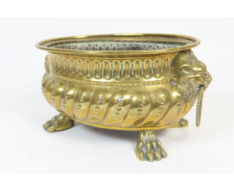 Dutch brass jardiniere, oval form with lion's mask ring handles and paw feet, 31cm (Viewing is by appointment only during pub