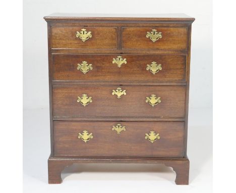 George III mahogany chest of drawers, circa 1780, having two short and three long graduating drawers with brass swan neck han