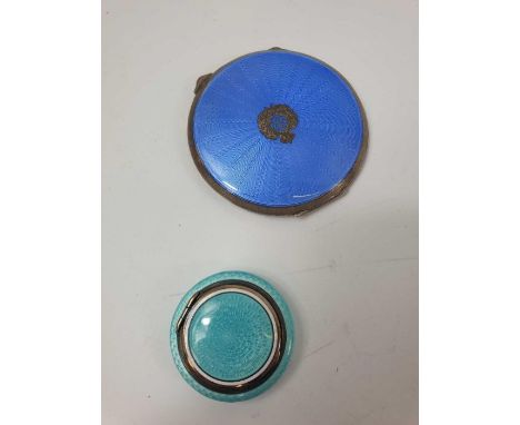 A silver and mid-blue guilloche enamel round compact, with Royal Engineers emblem to the front, the back with engine turned e