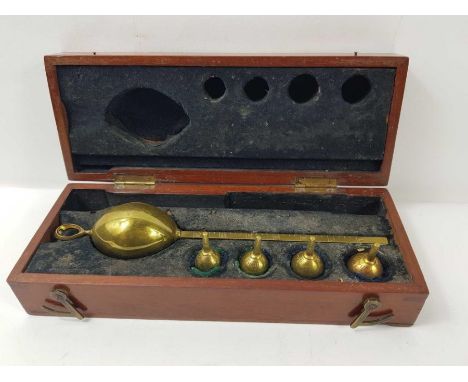 A vintage Bate's brass revenue saccharometer by Loftus, contained in a mahogany box, 26cm x 7.8cm x 5.8cm
