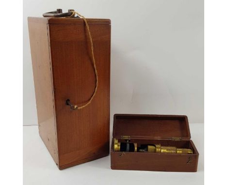 A mahogany cased R &amp; J Beck Ltd compound brass microscope with additional lenses, sold by A H Baird, Edinburgh; together 