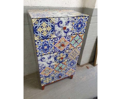 A 20th century decorative chest of five long drawers, the whole with simulated tile decoration with square teak handles and l