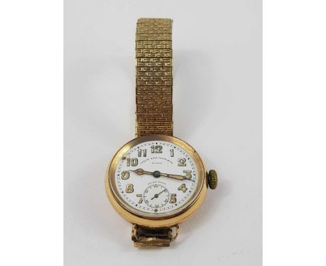 A West End Watch Co 'Extra' wrist watch, the round white enamel dial with luminescent Arabic numerals and hands, with subsidi