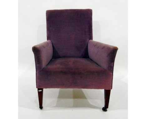 Edwardian upholstered square-back easy chair on square tapering supports and ceramic castors&nbsp;