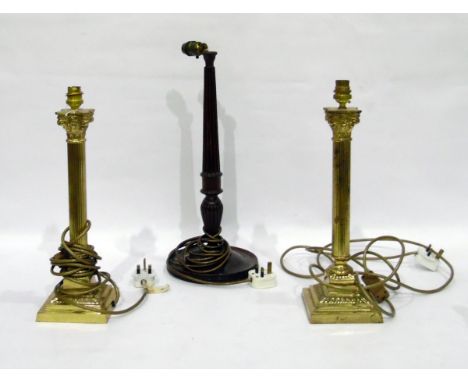 Pair of gilt metal Corinthian column table lamps&nbsp;and a reeded wooden table lamp&nbsp;(3)&nbsp;