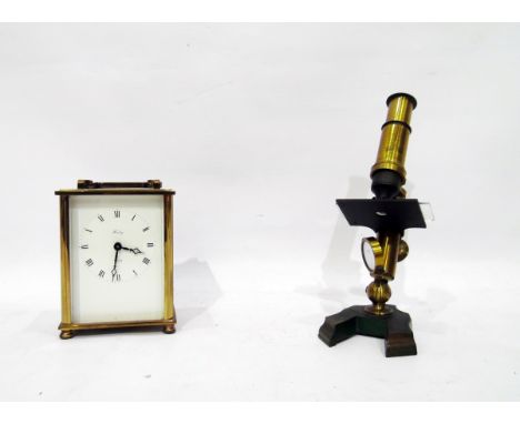 Brass and painted metal small microscope&nbsp;and&nbsp;a Henley quartz carriage clock&nbsp;(2)&nbsp;