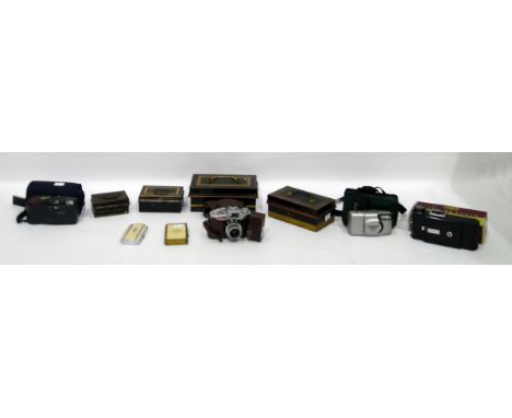 Kershaw King Penguin 820 camera, a Pax 35mm camera, a Jewish prayer book, an Olympus camera, four various cash boxes&nbsp;and