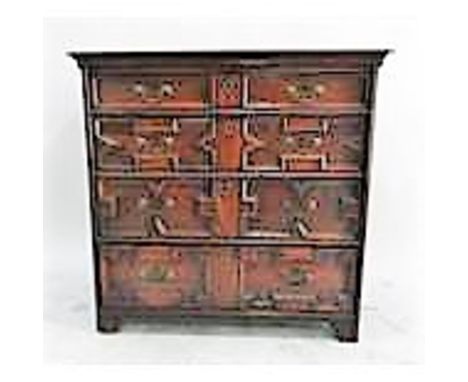Oak Jacobean chest of four graduated drawers, each with bale handle and geometric mouldings, on bracket type feet, 100cm wide