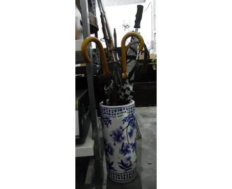 Ceramic Chinese-style umbrella stand&nbsp;with two vintage umbrellas, a golf umbrella, a parasol, a walking stick, a pair of 