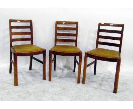 Set of four oak framed ladder back dining chairs, c. 1930's, with rexine upholstered drop-in seats&nbsp;