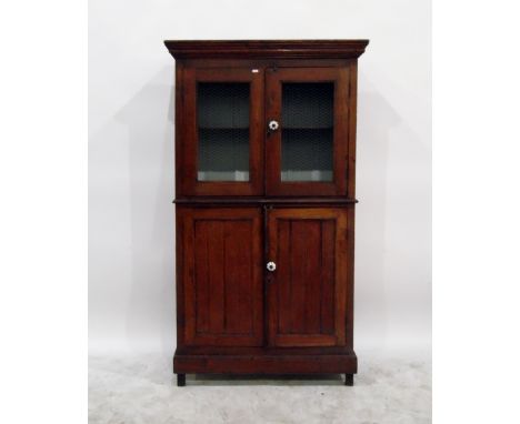 19th century oak food cupboard, having flat moulded cornice over two wire panelled doors with ceramic knob handle over two lo