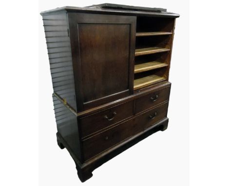 19th century mahogany linen chest&nbsp;having four sliding trays enclosed by two panelled doors, over two short and one long 