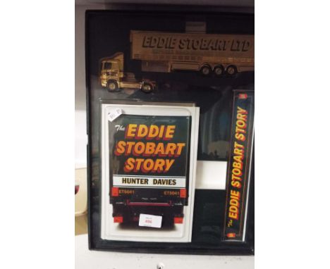 A Corgi 1:64 scale gold plated model Eddie Stobart lorry; Atkinson Borderer flat bed trailer CC12502