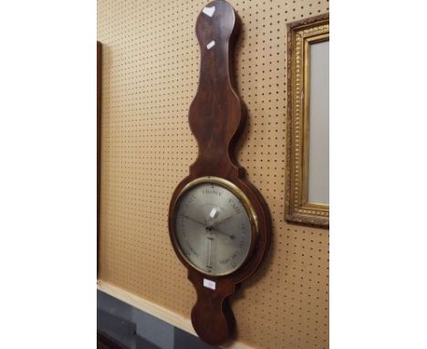 A 19thC inlaid mahogany cased wheel barometer, the silvered dial inscribed 'Lione, 14 Brook Street, Holborn' with thermometer