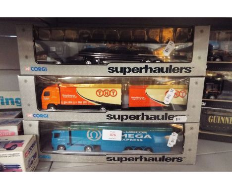 Three Corgi diecast lorries; Tate & Lyle ERF tanker 59515, TNT Volvo short wheelbase lorry and close couple trailer 59517, an