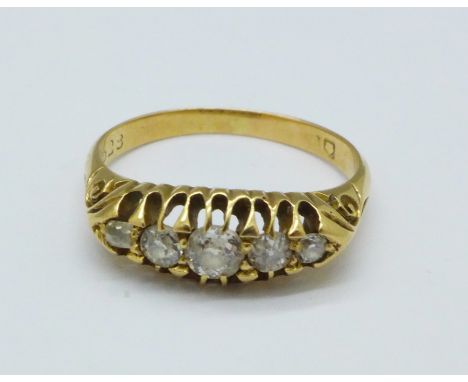 An 18ct gold and five stone diamond ring, 3.4g, N