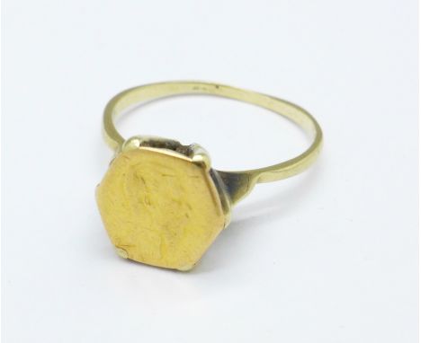 A 9ct gold ring set with a 22ct gold coin, 2.2g, N