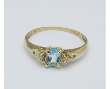 A 9ct gold, aquamarine and diamond ring, 1g, O