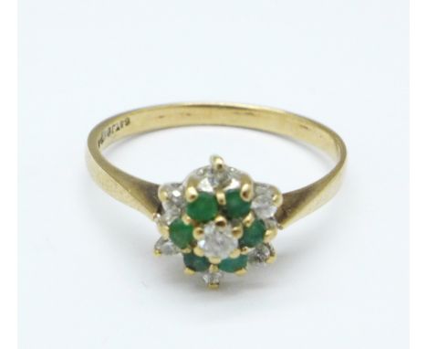 A 9ct gold, emerald and diamond ring, 1.7g, O