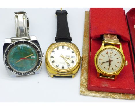 Three wristwatches; two Timex and a Roamer with box