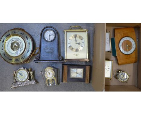 Eight clocks including Smiths, Schatz, London Clock Co., and a barometer
