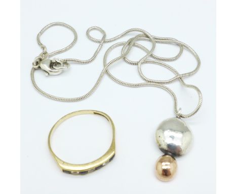 A 9ct gold ring, a/f, 2g, S, and a studio silver pendant and chain