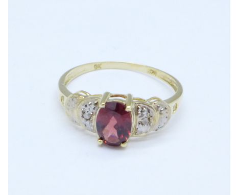 A 9ct gold, garnet and diamond ring, 1.4g, O