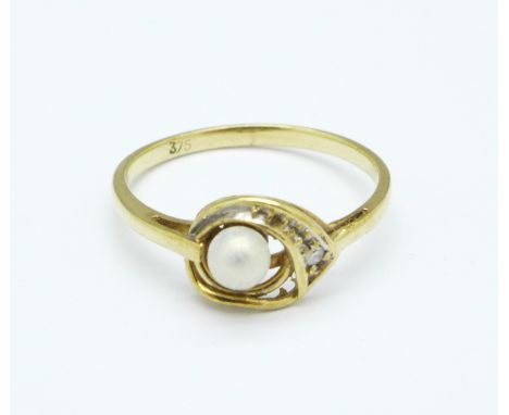 A 9ct gold, pearl and white stone ring, 1.2g, M