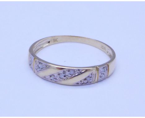 A 9ct gold and diamond ring, 1.2g, O