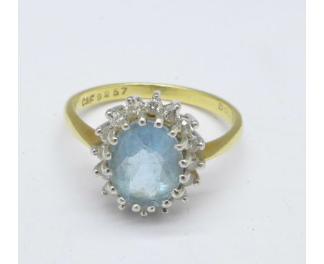 An 18ct gold, aquamarine and diamond ring, 4g, N