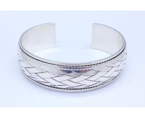 A silver bangle, 42g