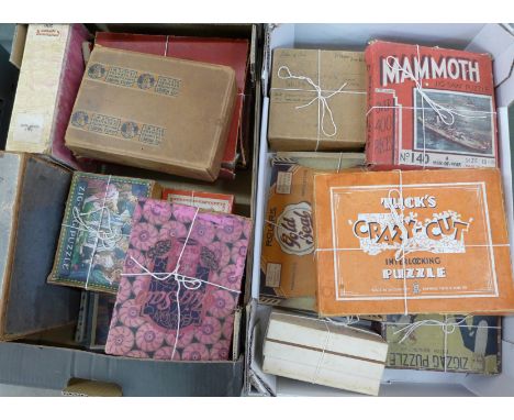 A Tuck's Zag-Zaw picture puzzle and seventeen other jigsaw puzzles including Rolark, Chad Valley and GWR