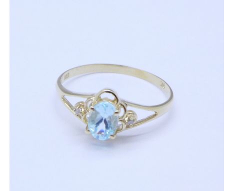 A 9ct gold, aquamarine and diamond ring, 1g, O