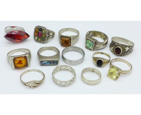 Silver and white metal rings, including one set with a ruby, emerald, coral, pearl and other stones and one marked Denmark