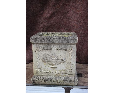 A cast stone planter with vase and swag decoration, 15" wide x 15" deep x 16" high 