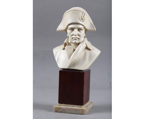 A composition portrait bust of the Emperor Napoleon, 5" high, on mahogany block base 