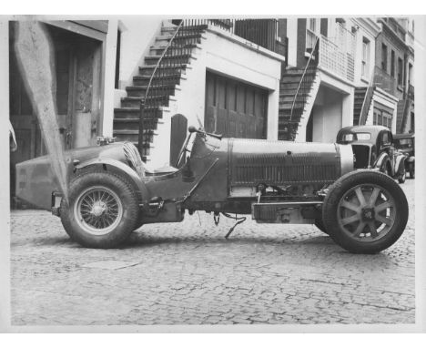 Bugatti Photographs. Seven photographs of a competition Bugatti in a London mews, identified as being chassis number 4896, a 