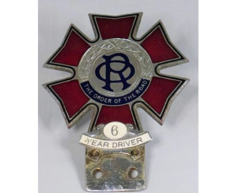 The Order of the Road. A red enamel badge promoting courtesy on the road, founded in 1928, this badge dating from the 1930s. 