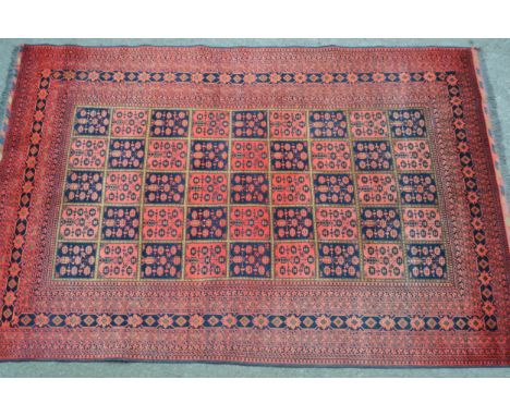 Modern Afghan Belouch carpet with an all-over tile pattern design and multiple borders, 290cms x 196cms approximately 