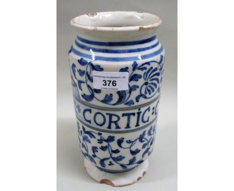 Italian tin glazed earthenware albarello decorated in blue and white and inscribed ' Cortic: Cedric ' between floral bands (c