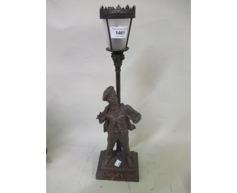 Early 20th Century patinated spelter table lamp, in the form of a street urchin under a street lamp, on marble base, indistin