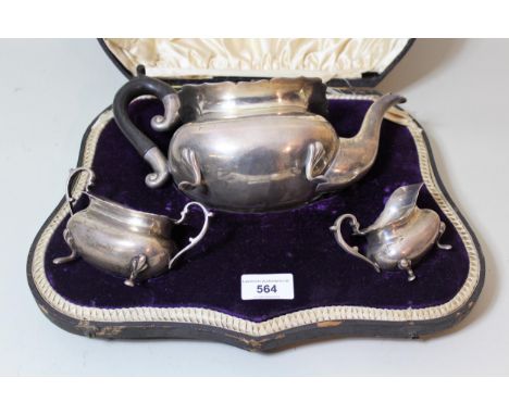 Cased Birmingham silver three piece tea service with ebonised handle by Walker & Hall, 24oz t 