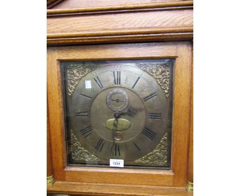 Oak longcase clock, the architectural hood with flanking pilasters above a rectangular panel door and conforming plinth, the 